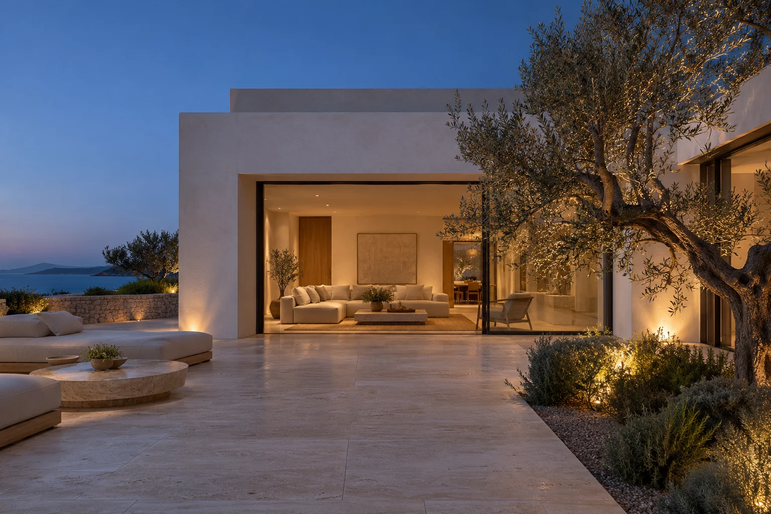 Casa Sol courtyard villa at dusk with warm interior light